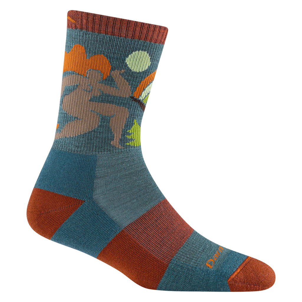 5016 Trailblazer in teal featuring a rust heel/toe/band and cuff, blue body color and a front body outline design